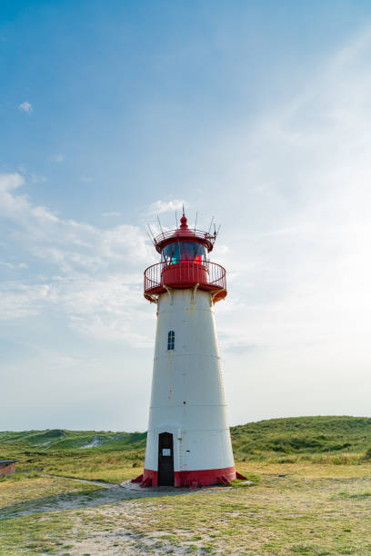 istock Lighthouse red white on dune. Sylt island – North Germany. 1161929242