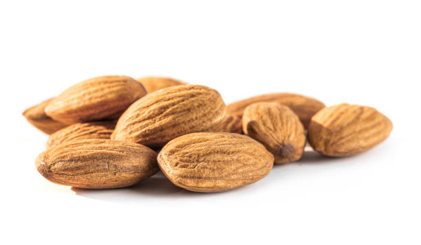 istock almond seeds isolated on white background 1161930390
