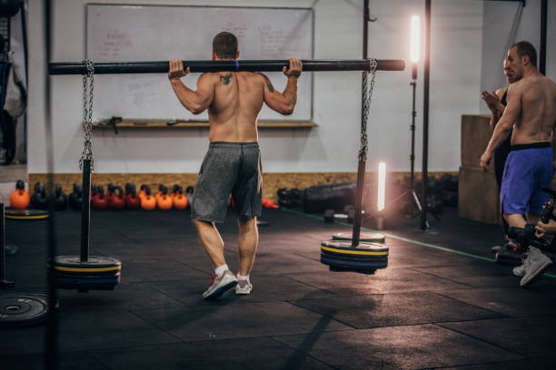 istock Man exercising at the gym 1161930558