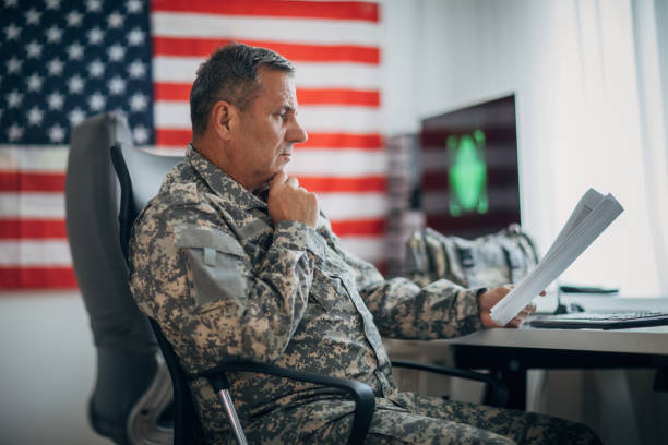 istock Man in uniform at work in the office 1161935767