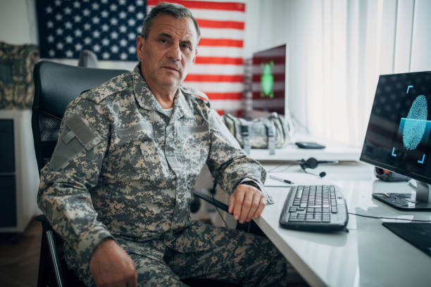 istock Man in uniform at work in the office 1161935950