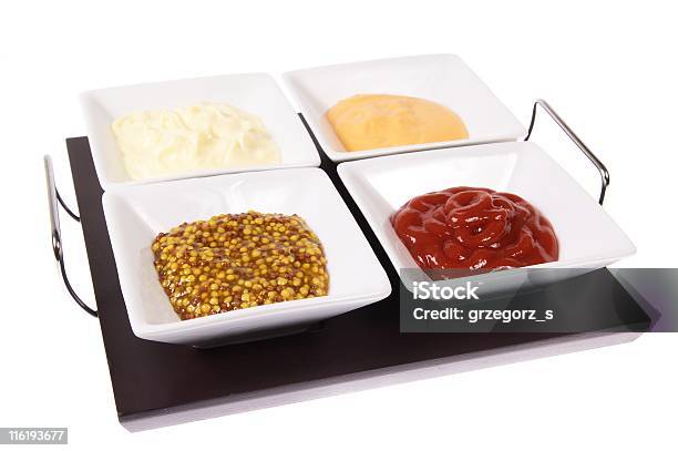 Tray With Condiment Dishes Stock Photo - Download Image Now - Black Color, Bowl, Carrying