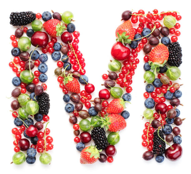 istock letter M made of berries 1161938512