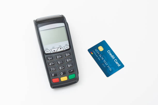 istock Credit card terminal on white background 1161939864