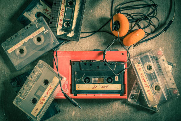 istock Retro audio cassette with headphones and red walkman 1161940277