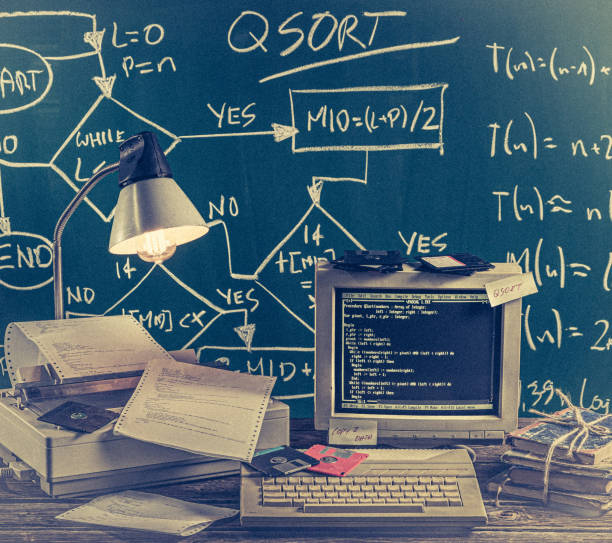 istock This was ages ago, computer lab on green chalkboard background 1161940294