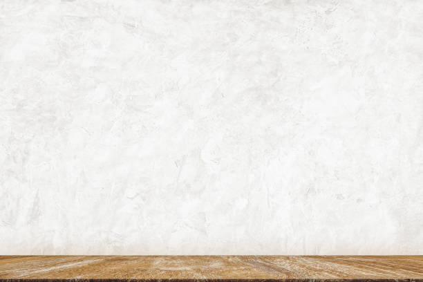 istock Minimal Wood table top on white concrete paint wall background for background Ready used as display or montage products design 1161941362