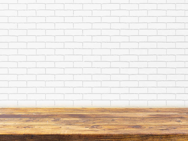 istock Minimal Wood table top on white brick wall background Ready used as display or montage products design mockup 1161941363