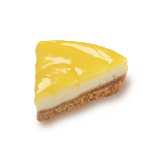 istock Slice of lemon cheesecake isolated on white 1161941951