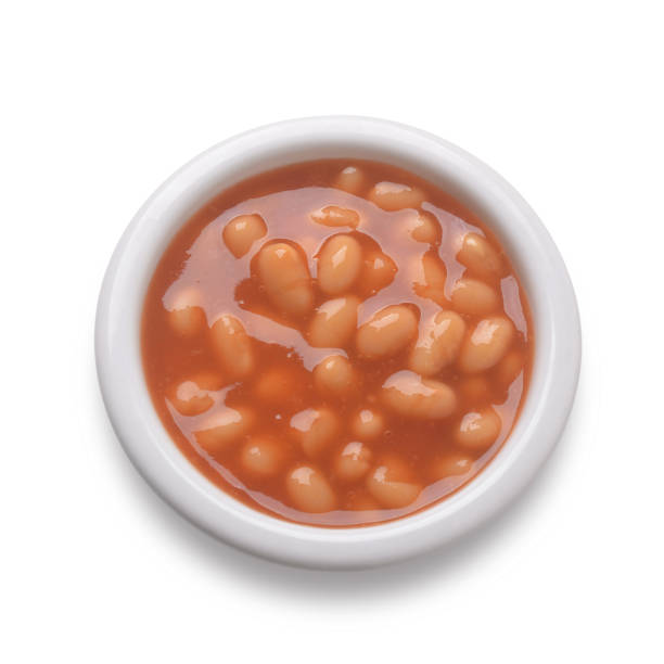 istock Portion of baked beans in small white bowl 1161942003