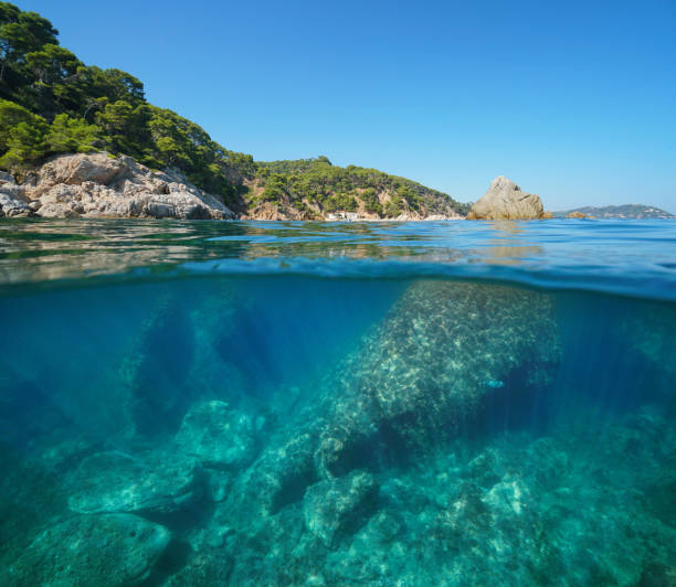 istock Rocky coastline with large rocks underwater sea 1161945818