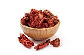 Sun dried tomatoes in a bamboo bowl