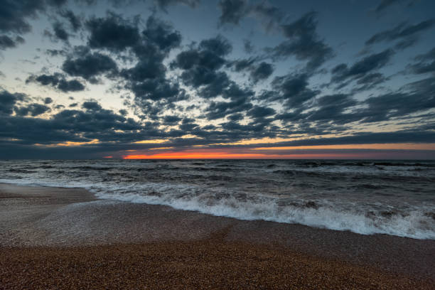 istock Sea beach at colorfuf sunset time 1161946852
