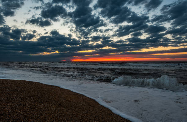 istock Sea beach at colorfuf sunset time 1161946856