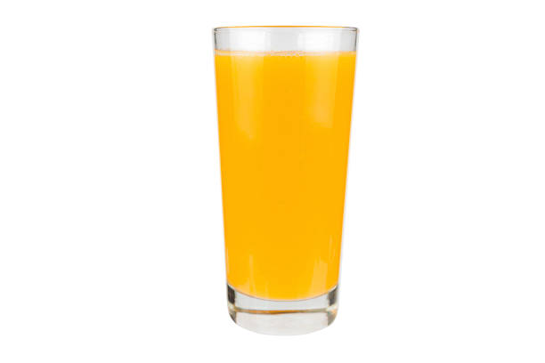 istock Orange juice glass, isolated on white background. 1161948691