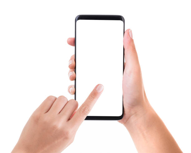 Woman hand holding blank white screen smart phone on white background. Isolated on white.