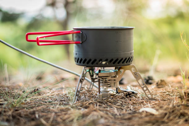 istock Foldable camping gas fire system  with a pot with radiator for fast heating 1161949543