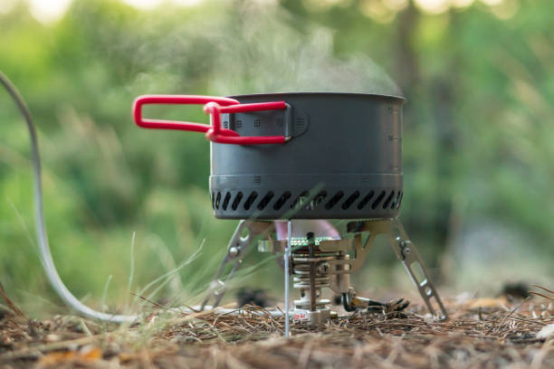 istock Foldable camping gas fire system  with a pot with radiator for fast heating 1161949544