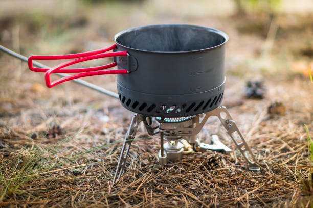 istock Foldable camping gas fire system  with a pot with radiator for fast heating 1161949643