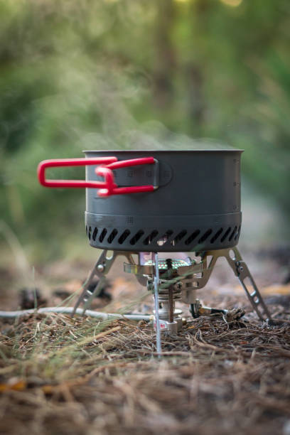 istock Foldable camping gas fire system  with a pot with radiator for fast heating 1161949644