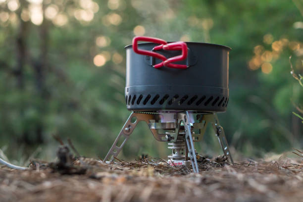 istock Foldable camping gas fire system  with a pot with radiator for fast heating 1161949646