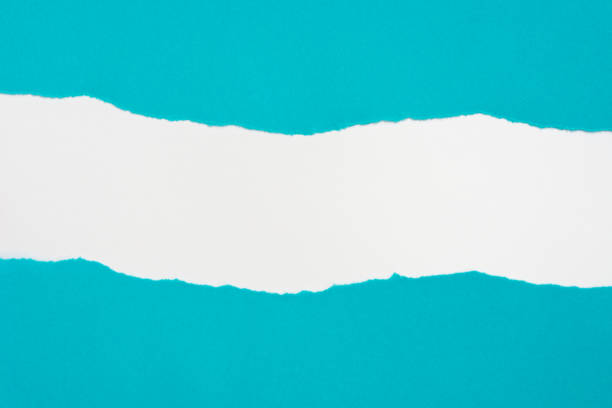 istock pieces of blue paper on white background with copy space 1161951122