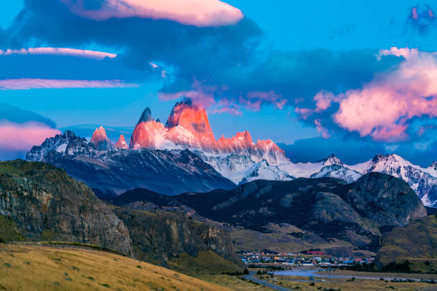 View of Mount Fitz Roy in the morning sunlight at El Chalten Village View of Mount Fitz Roy in the morning sunlight at El Chalten Village in the Los Glaciares National Park, Argentina mt fitzroy photos stock pictures, royalty-free photos & images