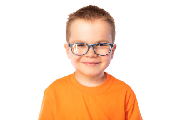istock Little cute boy with glasses smiling isolated on white background 1161953533