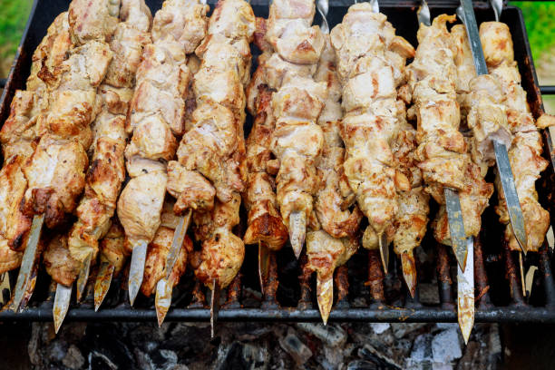 istock Meat skewers being grilled barbecue 1161957374