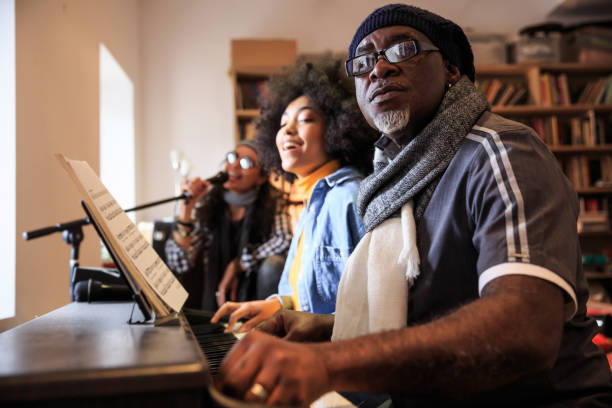 istock Band playing and singing at home 1161959391
