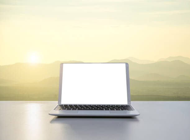 istock Notebook Laptop in the office The background nature and mountains 1161961342