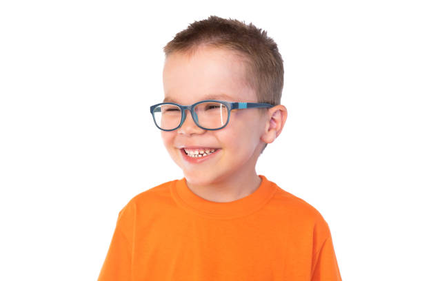 istock Little cute boy with glasses smiling isolated on white background 1161961880
