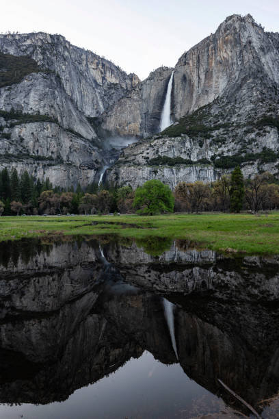 istock Yosemite Falls and reflection on Merced River, El Capitan Meadow, California 1161964012