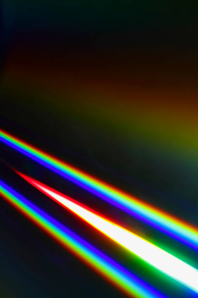 istock Beams of light refracting and creating a rainbow spectrum of colours 1161965729
