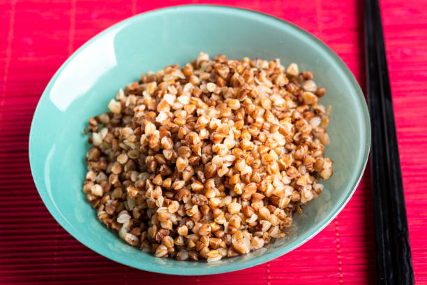 istock bowl full of buckwheat and chopsticks 1161967465