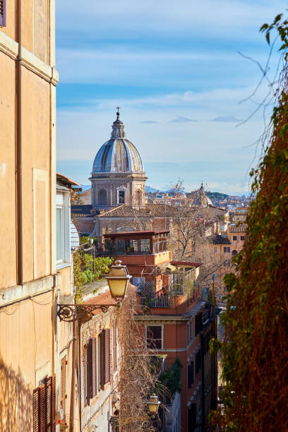 istock Rome street and skyline 1161970186