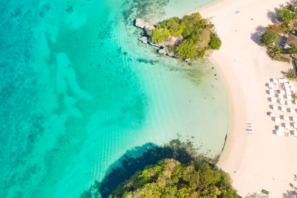 istock Blue sea and white sandy beach in sunny weather 1161970204