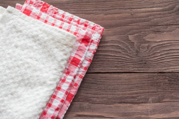 istock stack of kitchen towels on wooden background 1161973644