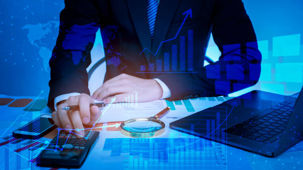 istock close up of businessman is analyzing data in office 1161974724
