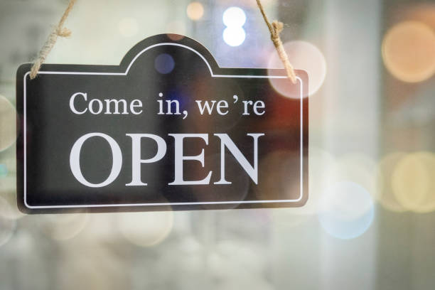 istock open sign hanging outside a restaurant, store, office or other 1161978297