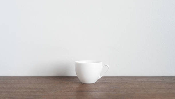 istock Coffee on wooden table in front of background 1161978438