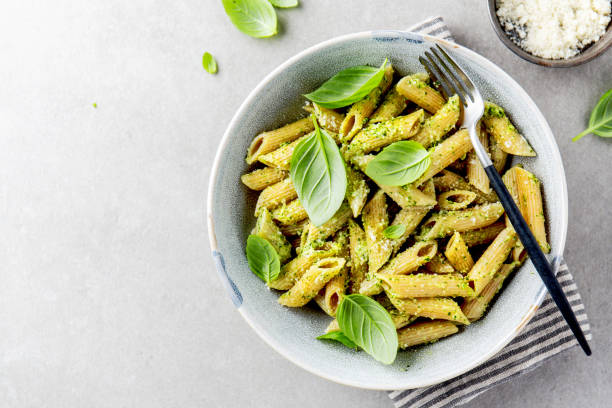 istock Tasty appetizing pasta with pesto sauce 1161980837