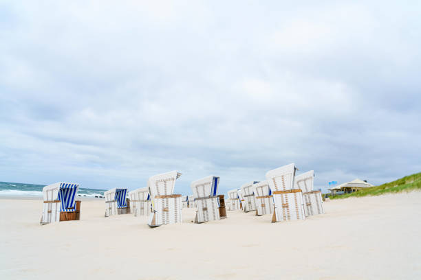 istock Beach - chairs on the island Sylt. Germany.  Summer cloudy weather. 1161981103