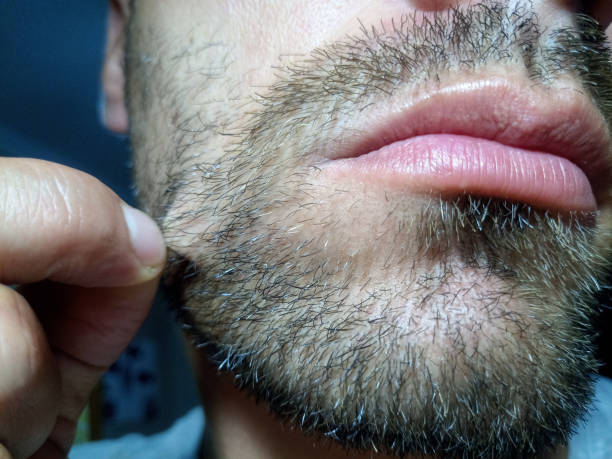 istock Bearded young man, stubble near. Unshaven more than a week. 1161981884