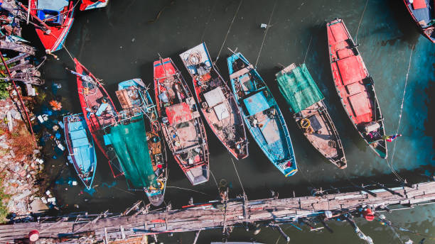 istock Top view from sky  group of wooden fishery boat. 1161982906