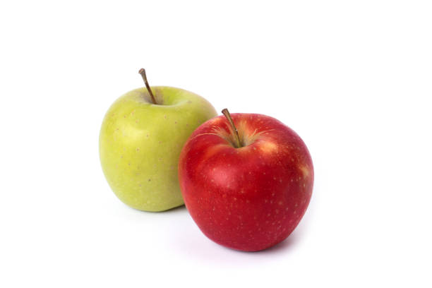istock Red and green apple on a white background. 1161983337