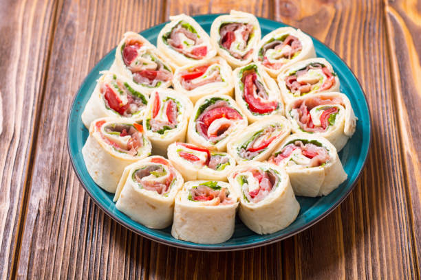 istock Sliced sandwich tortilla with vegetables and ham 1161989019