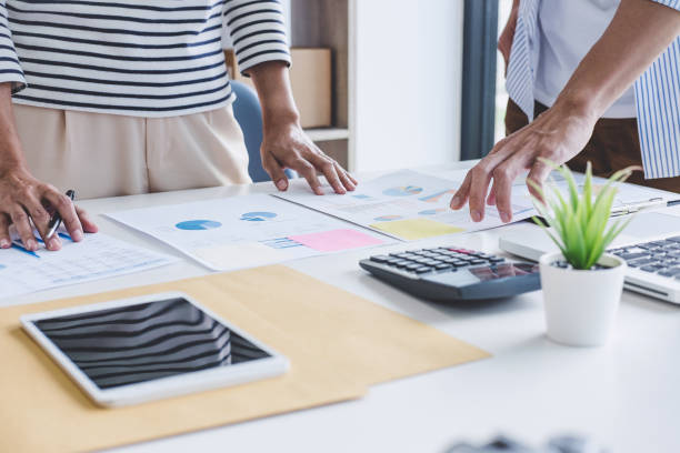 istock Business team collaboration discussing working analysis with financial data and marketing growth report graph in team, Meeting Talking Brainstorming Communication Concept 1161989299