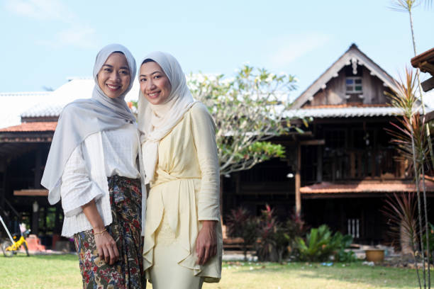 istock Two Young Malay Muslim Women Posing Together 1161990448