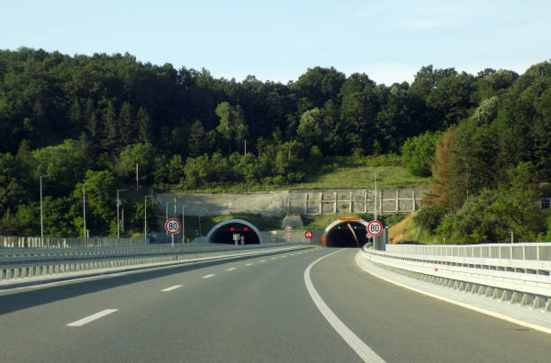 istock Tunnels in the both directions on the modern multiple lane highway 1161991734